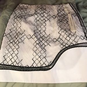 white skirt with black/white lace